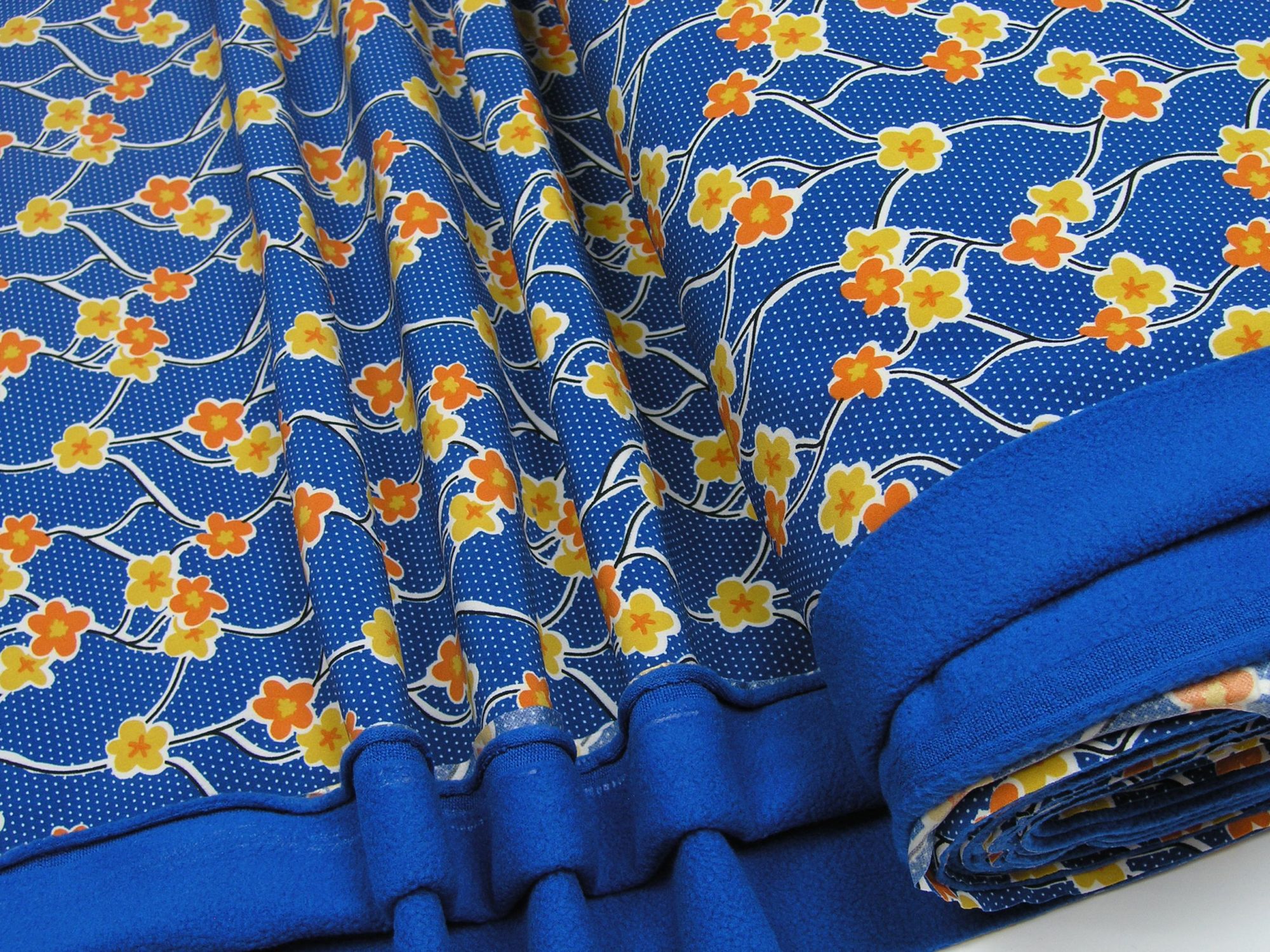 Softshell flowers and tendrils on blue