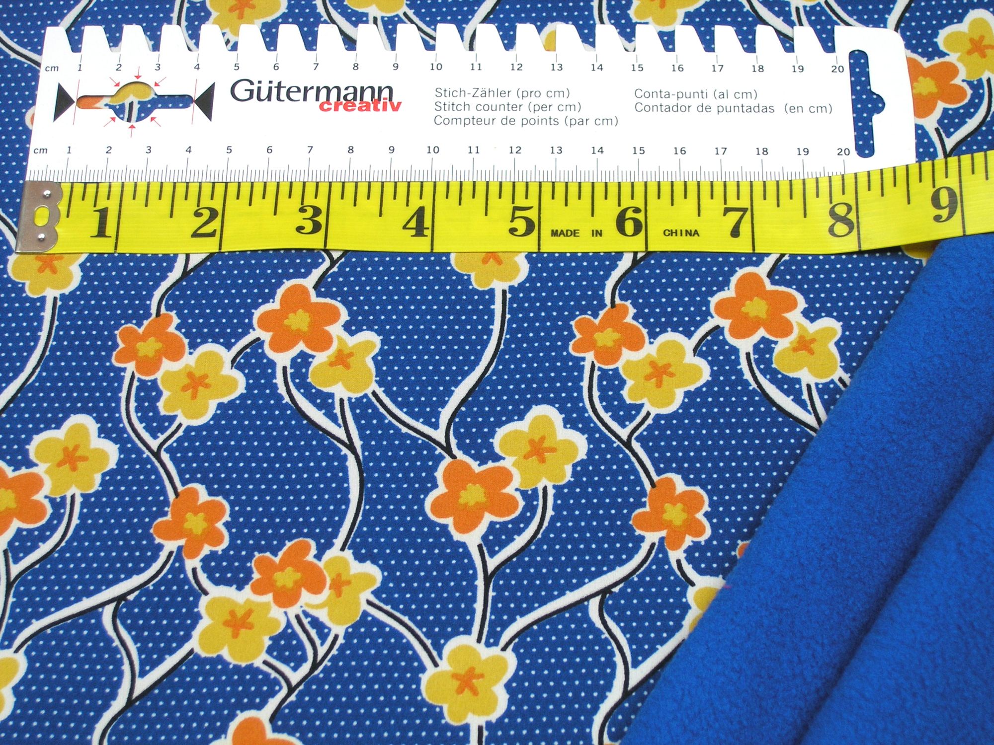 Softshell flowers and tendrils on blue