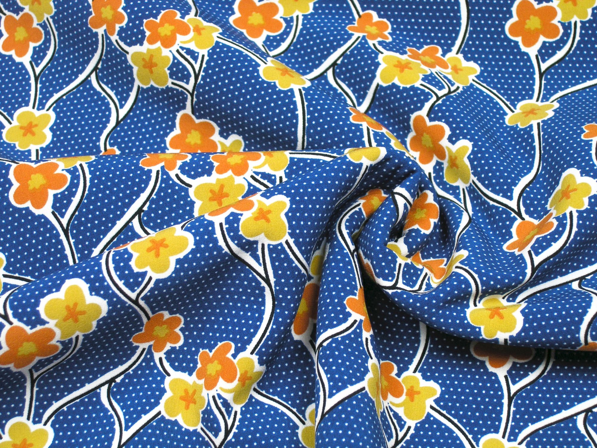Softshell flowers and tendrils on blue