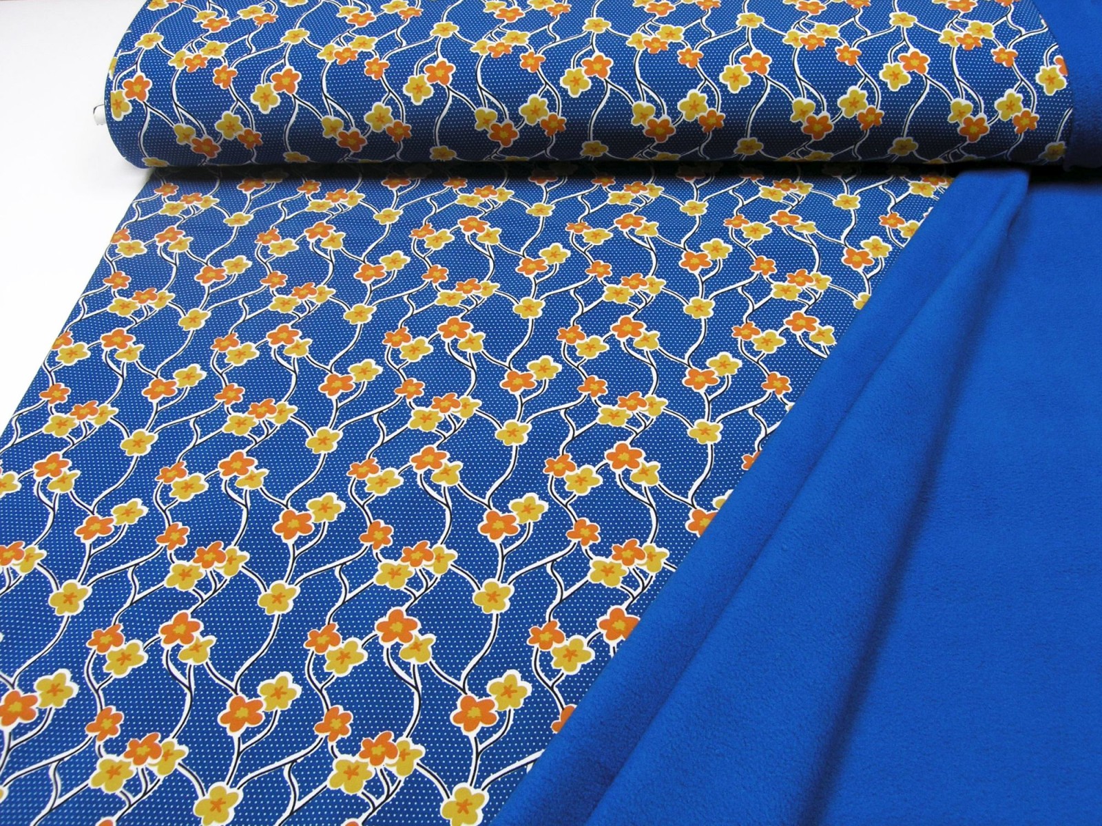 Softshell flowers and tendrils on blue